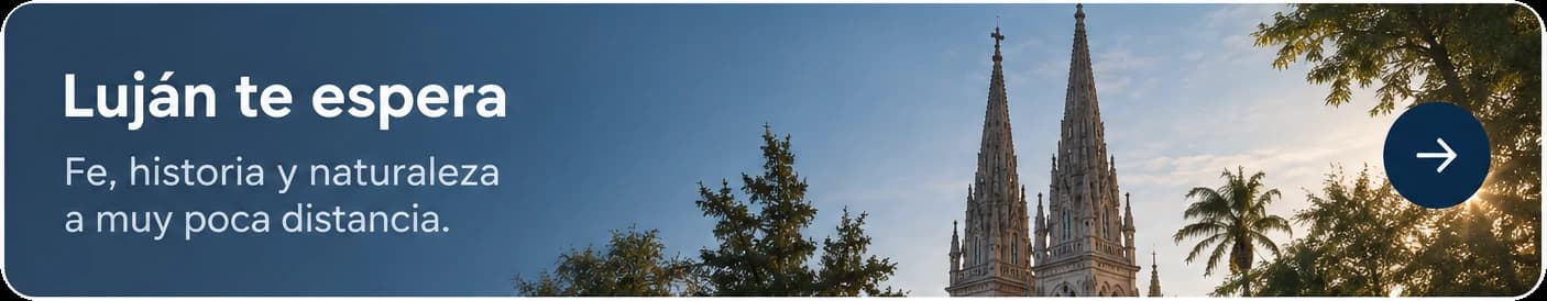 The towers of the Basilica of Luján among the trees, at sunset.
